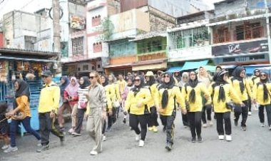 Dalam Rangka HUT Rohil ke-24 dan Bulan Inklusi Keuangan Ratusan Warga Jalan Santai Bersama