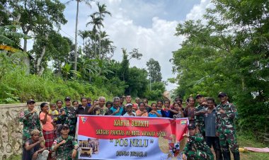 Pos Nelu Satgas Yonkav 6/Naga Karimata Gelar Gotong Royong dengan Masyarakat untuk Perbaikan Jalan