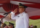 Wabup Husni Tamrin Pimpin Upacara Penurunan Bendera HUT ke-81 RI di Pelalawan